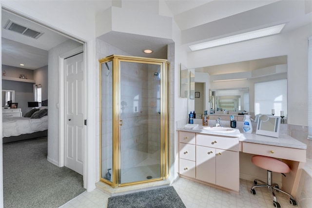 14247 Spanish Wells Dr, Hudson, FL 34667 - ensuite bathroom with visible vents, a shower stall, ensuite bath, and vanity