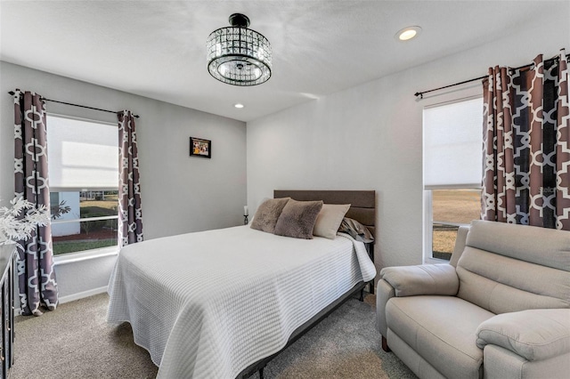 14247 Spanish Wells Dr, Hudson, FL 34667 - bedroom featuring carpet, multiple windows, baseboards, and recessed lighting