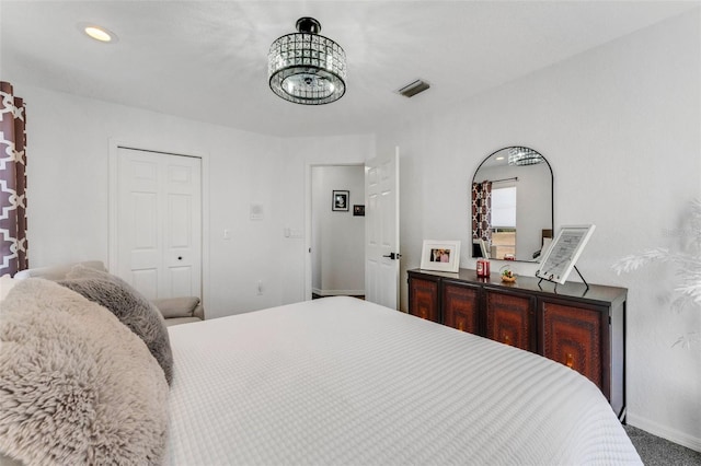 14247 Spanish Wells Dr, Hudson, FL 34667 - bedroom with recessed lighting, visible vents, baseboards, carpet, and an inviting chandelier