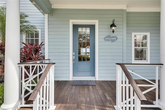 doorway to property featuring a porch