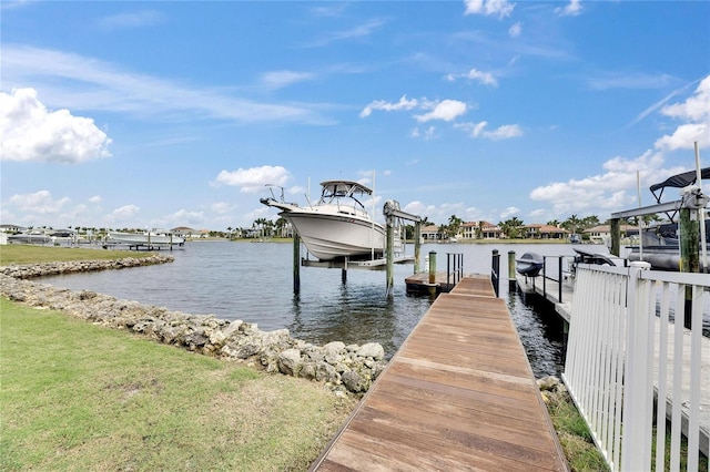 view of dock with a water view and boat lift