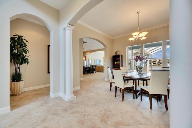 dining space with crown molding, an inviting chandelier, decorative columns, and baseboards