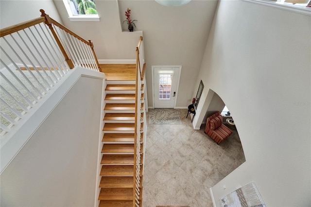 staircase with baseboards