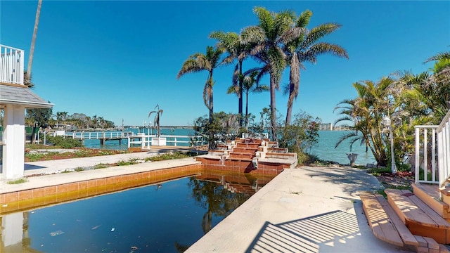 dock area featuring a water view