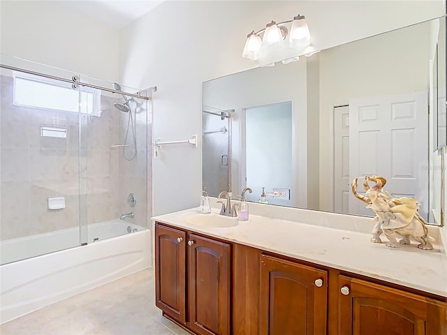 bathroom with vanity, tile patterned floors, and shower / bath combination with glass door