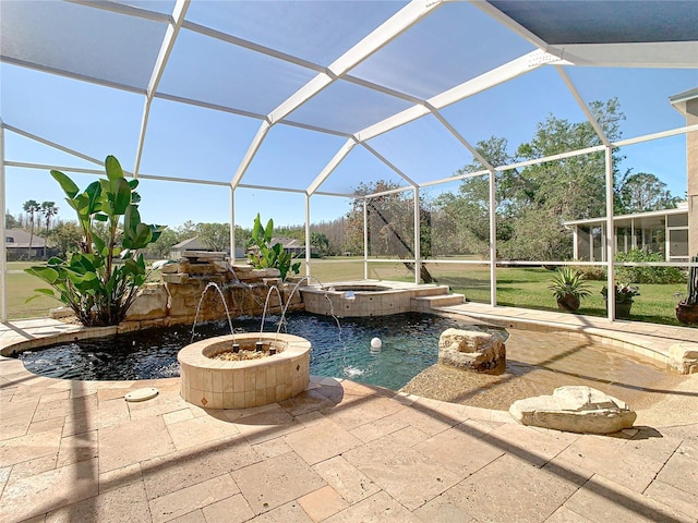 view of swimming pool with glass enclosure, an in ground hot tub, and a patio area