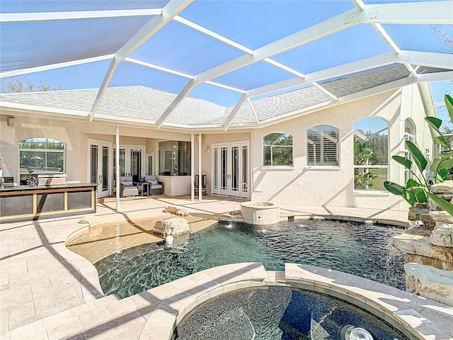 view of swimming pool with a lanai, area for grilling, french doors, and a patio