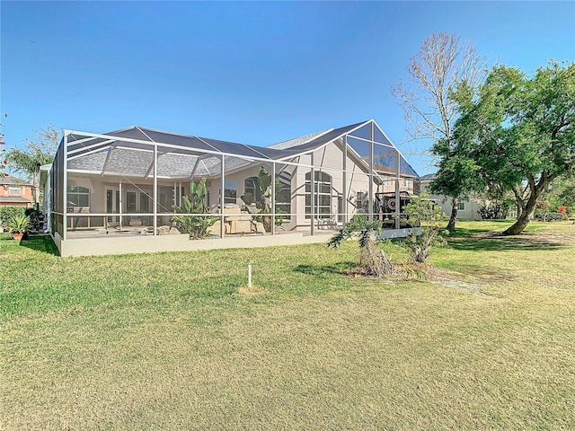 18111 Diamond Cove Ct, Tampa, FL 33647 - rear view of house with a lawn and a lanai
