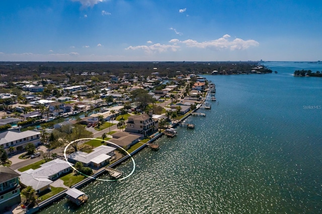 aerial view featuring a residential view and a water view