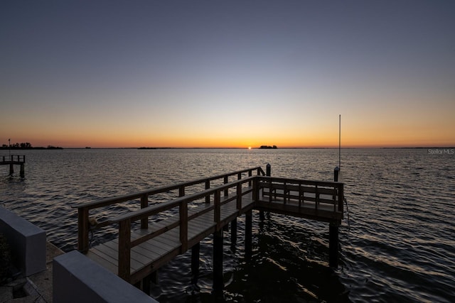 view of dock with a water view