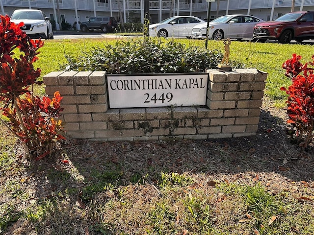 view of community sign