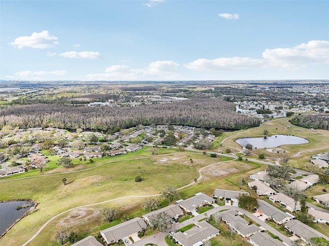 aerial view with a residential view and a water view