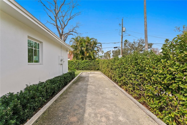 view of yard featuring a patio and fence