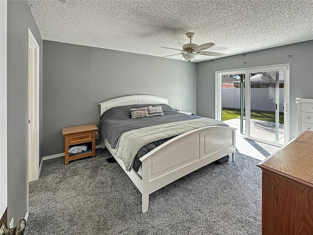 bedroom featuring dark colored carpet, a ceiling fan, a textured ceiling, access to outside, and baseboards