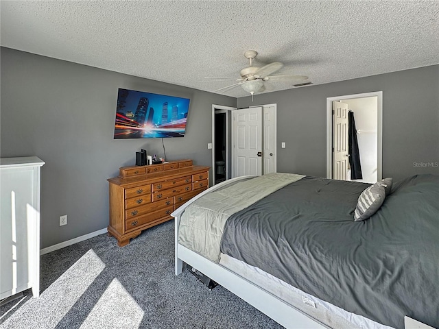 bedroom with visible vents, dark carpet, a ceiling fan, a textured ceiling, and baseboards