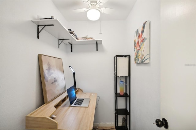 office space featuring a ceiling fan