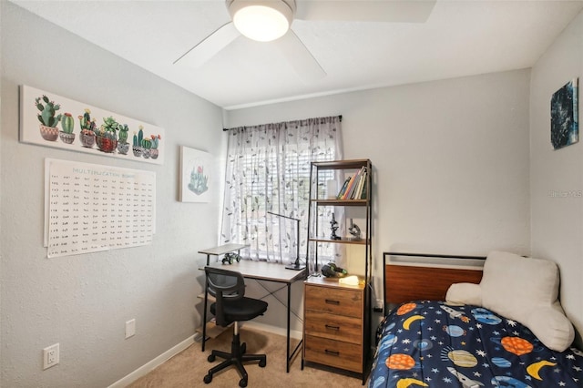 bedroom featuring light carpet, baseboards, and a ceiling fan