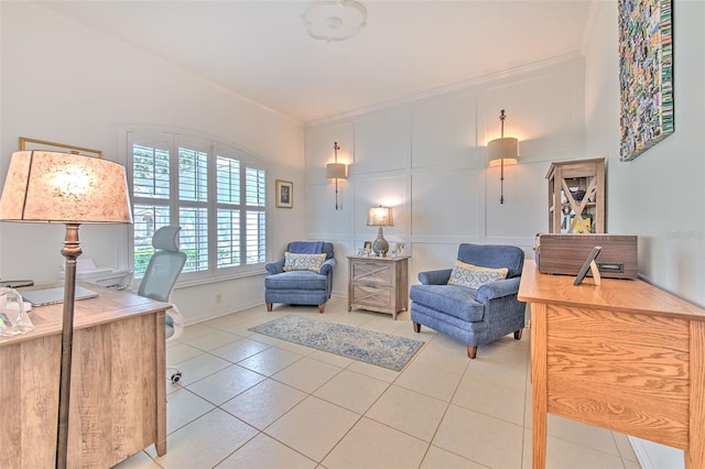 office with light tile patterned floors, a decorative wall, and crown molding