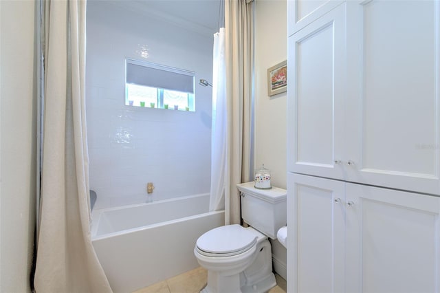 bathroom with shower / tub combo, toilet, and tile patterned floors