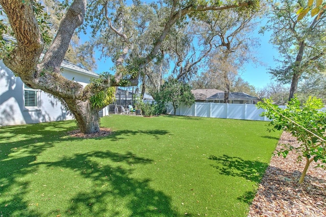 view of yard featuring fence