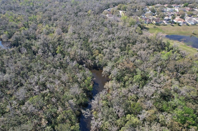 aerial view with a wooded view