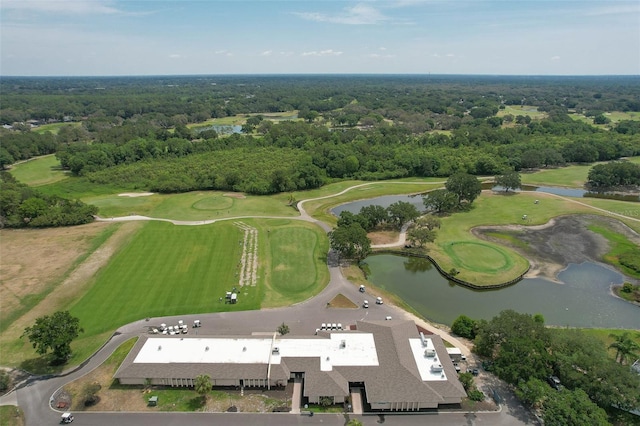 aerial view with a water view, a wooded view, and golf course view