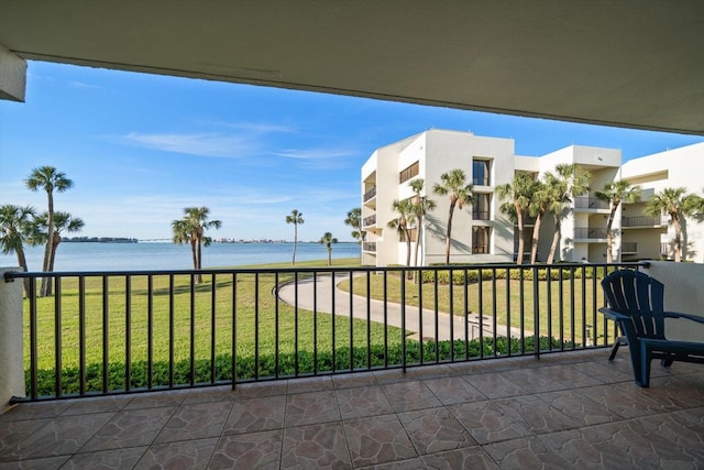 balcony featuring a water view