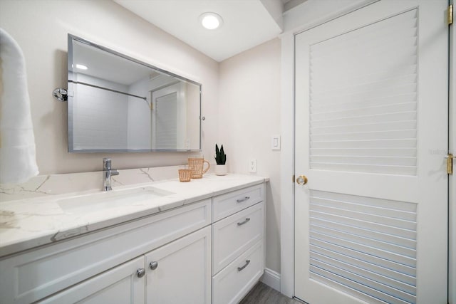 full bath with recessed lighting and vanity