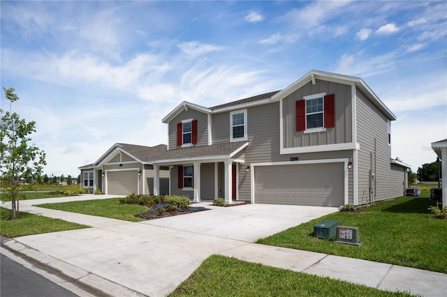 view of front of house with a porch, concrete driveway, board and batten siding, a garage, and a front lawn