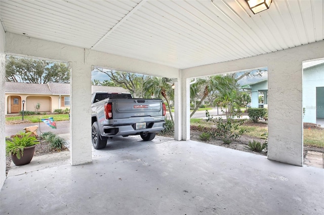 view of patio featuring a carport