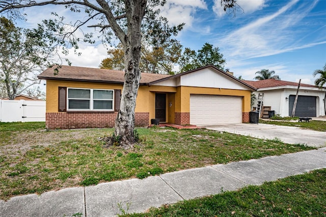 ranch-style house featuring a garage, driveway, a gate, fence, and brick siding