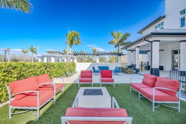 view of patio / terrace featuring an outdoor living space with a fire pit