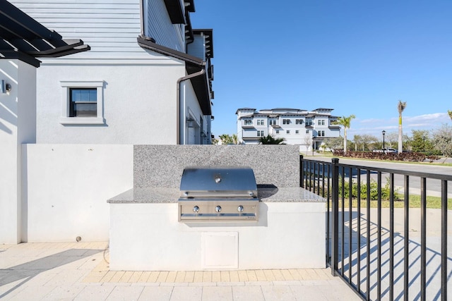 view of patio with a grill and area for grilling