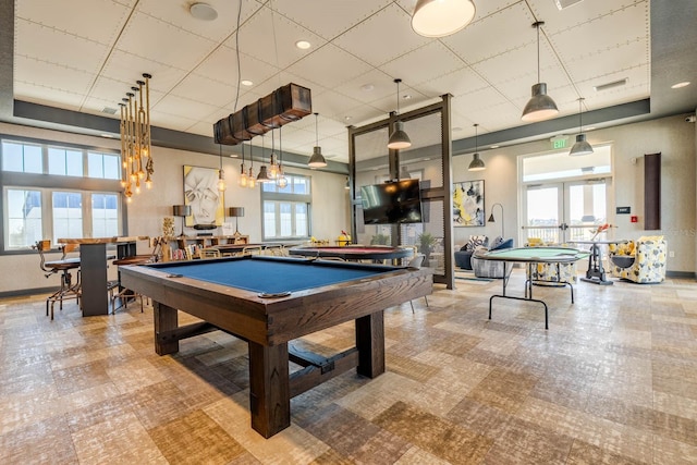 playroom featuring pool table, a drop ceiling, and french doors