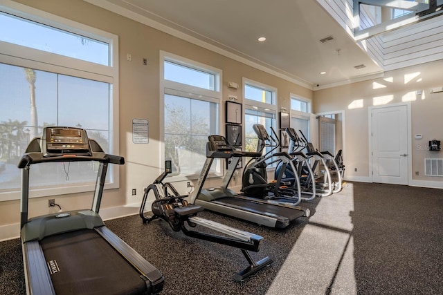 gym with recessed lighting, visible vents, baseboards, and ornamental molding