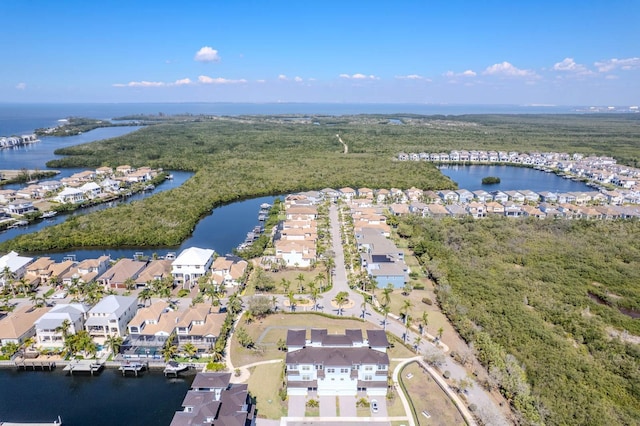 bird's eye view with a water view and a residential view