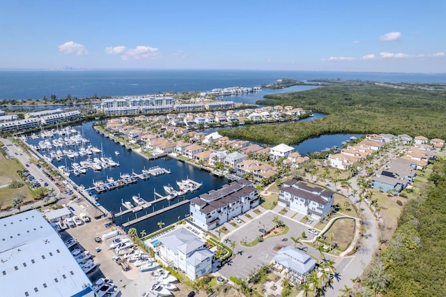 birds eye view of property featuring a water view