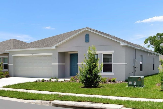 1931 Rosewood Cir, Lakeland, FL 33810 - view of front of property featuring a garage, stucco siding, driveway, and a front lawn
