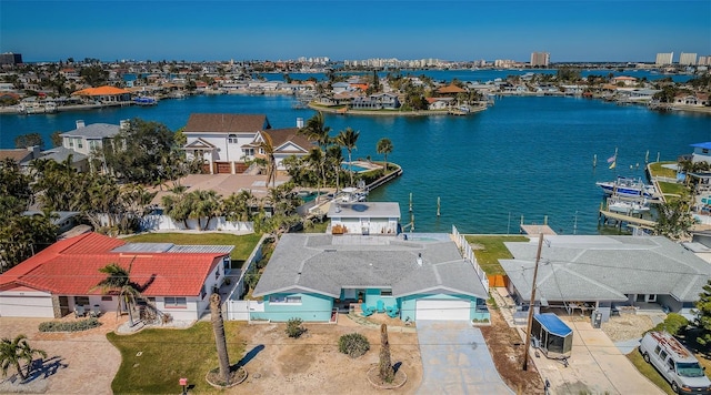 birds eye view of property featuring a water view