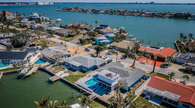 aerial view with a water view and a residential view