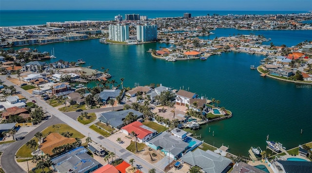 bird's eye view featuring a view of city and a water view