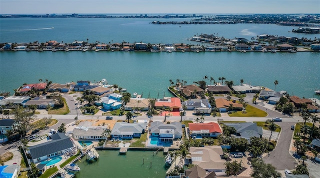 bird's eye view with a water view and a residential view