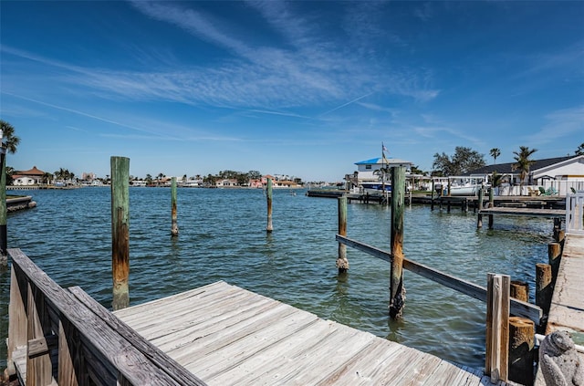 view of dock with a water view and boat lift