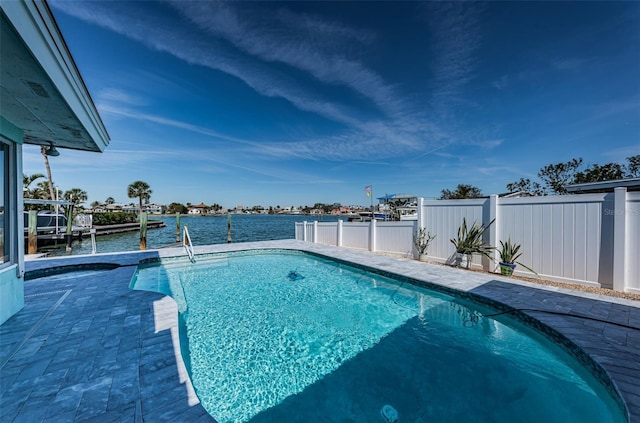 629 59th Ave, St Pete Beach, FL 33706 - pool with a fenced backyard, a patio, and a water view