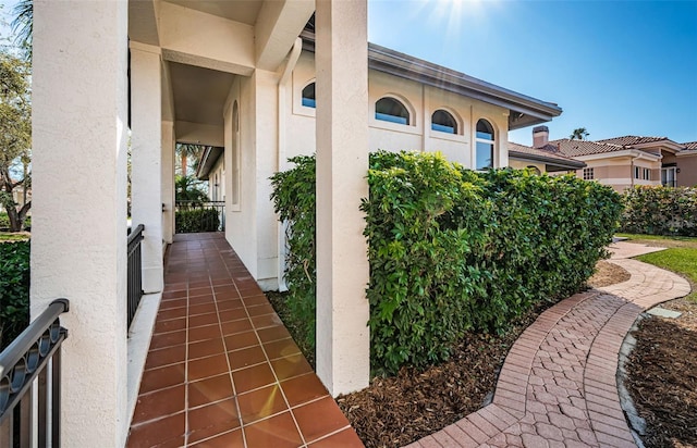 doorway to property with stucco siding