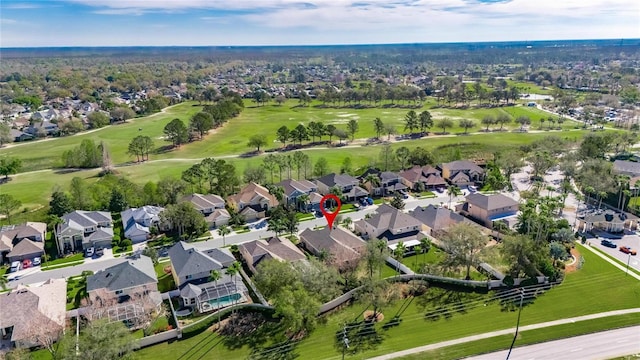 bird's eye view with a residential view and view of golf course