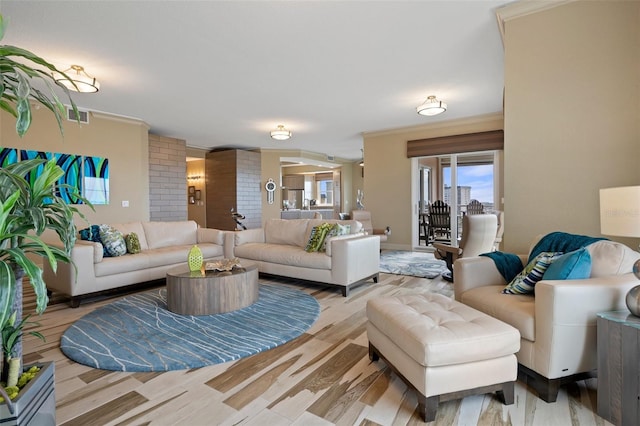 4951 Bacopa Ln S Unit 801, Saint Petersburg, FL 33715 - living area with visible vents, wood finished floors, and ornamental molding