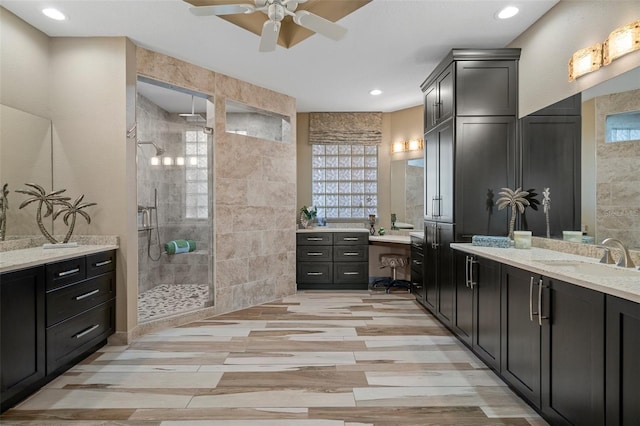 4951 Bacopa Ln S Unit 801, Saint Petersburg, FL 33715 - full bath with a sink, wood finished floors, two vanities, and a stall shower