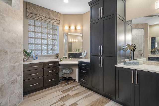 4951 Bacopa Ln S Unit 801, Saint Petersburg, FL 33715 - full bathroom featuring recessed lighting, wood finished floors, and vanity