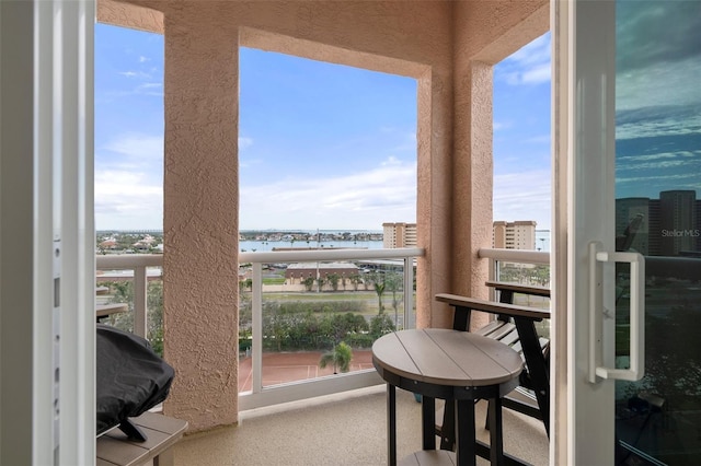 4951 Bacopa Ln S Unit 801, Saint Petersburg, FL 33715 - balcony with grilling area and a water view